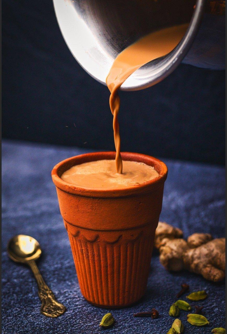 Chai poured into a terracotta kulhad